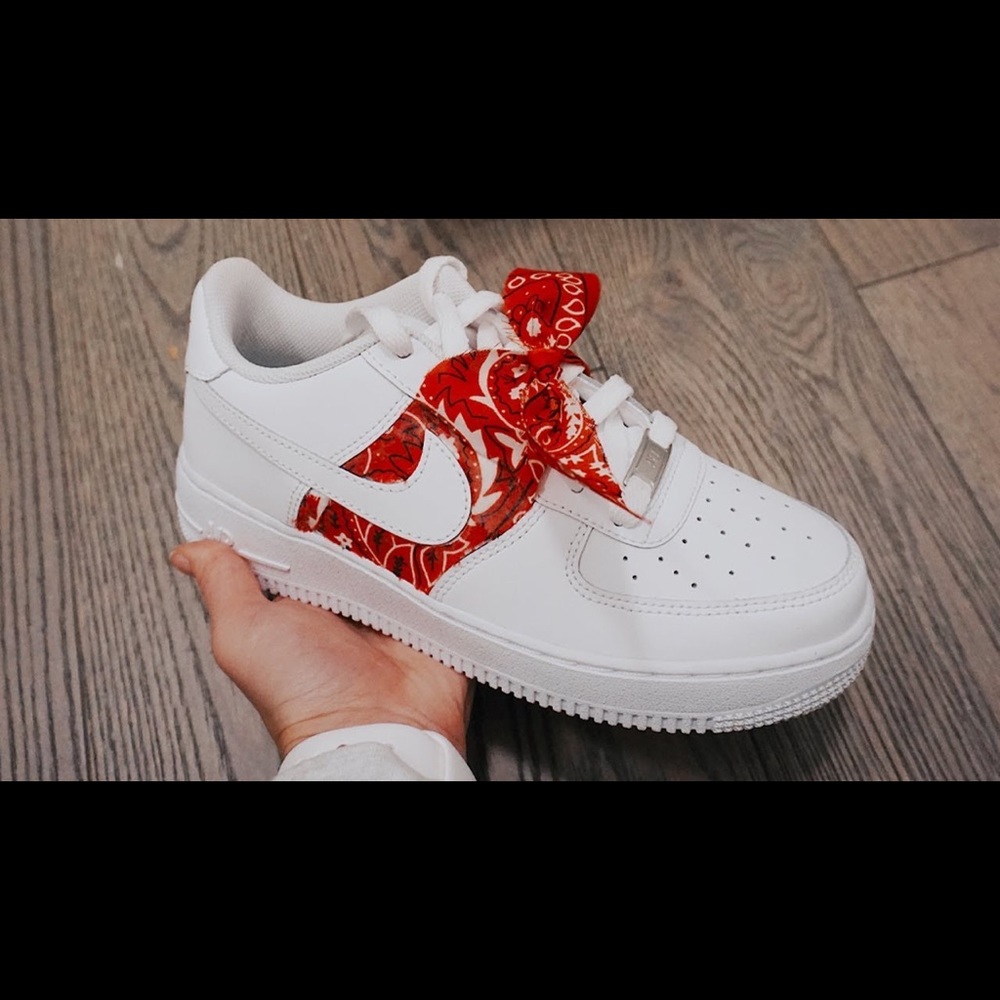 White Nike Air Force 1’s with red bandana.